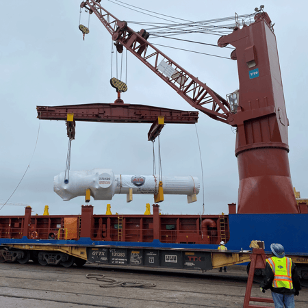 Tube bundle being discharged from vessel